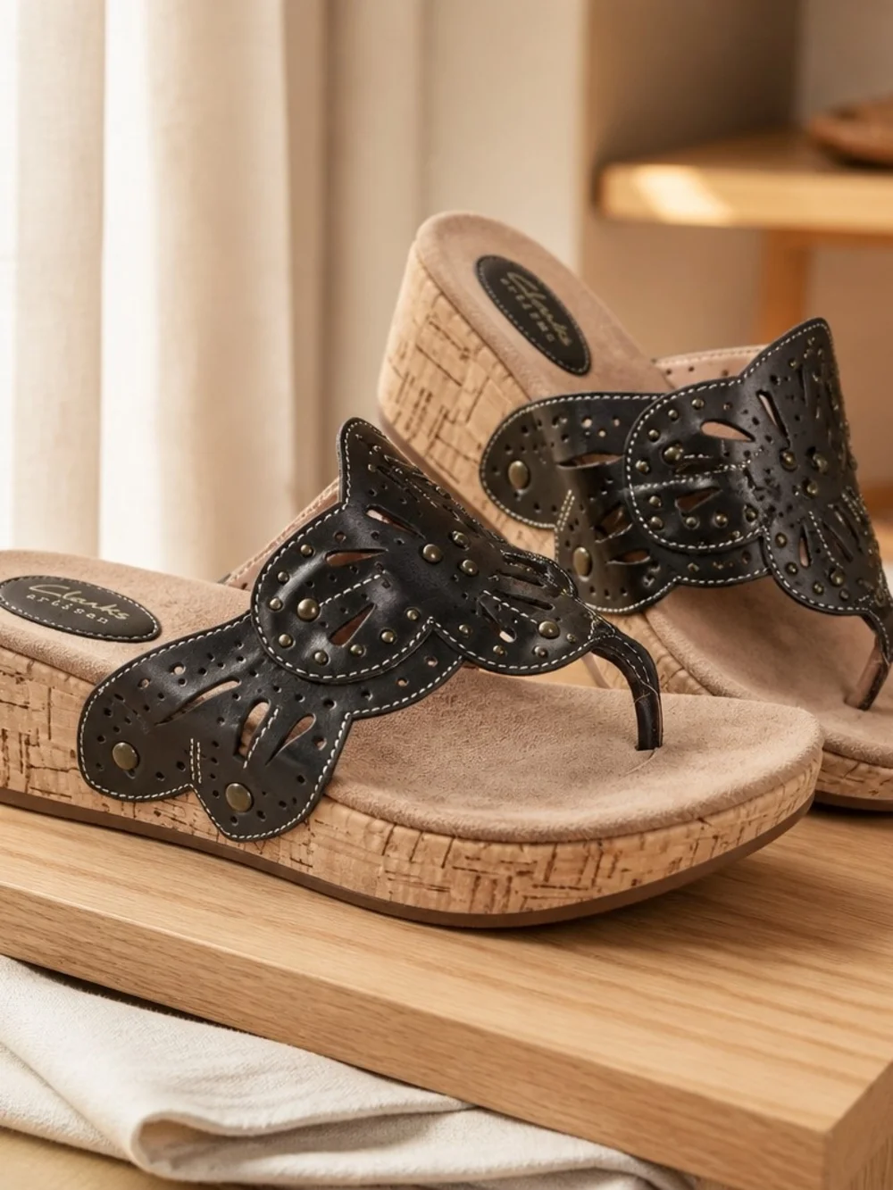 Clarks Women’s Black Leather Cutout Wedge Sandals